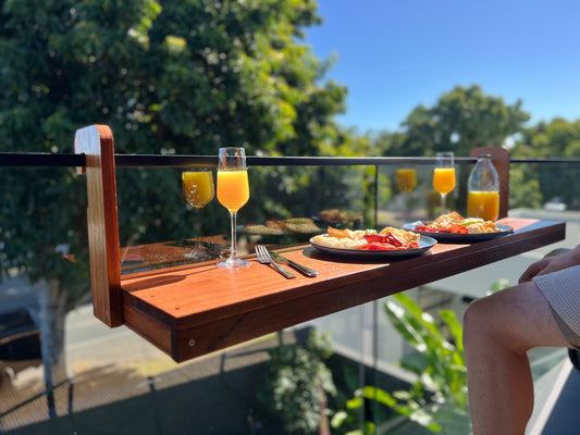 Australian-made Bench Bar hanging from a balcony balustrade for outdoor entertaining